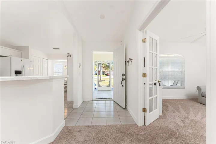 View of carpeted foyer