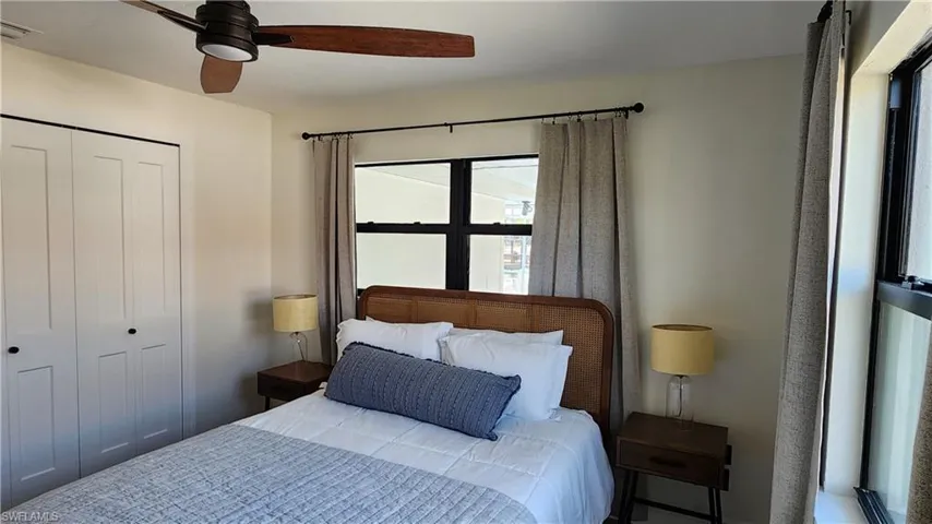 Bedroom with a closet and ceiling fan