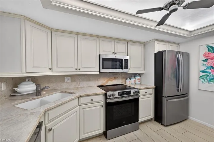 Kitchen with new stainless steel appliances