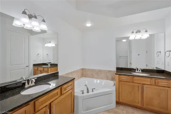 Primary Bathroom #1 with dual sinks, separate tub and shower
