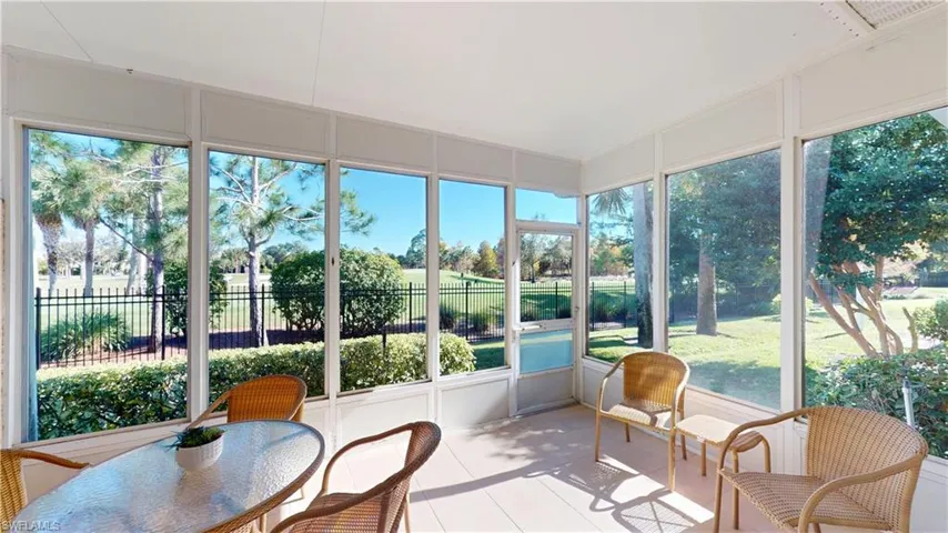 Sunroom featuring tile patterned floors