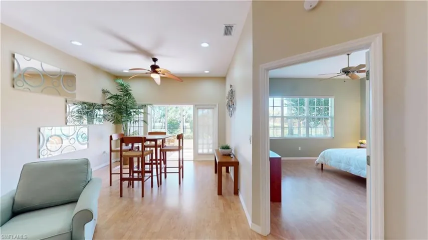 Dining space featuring ceiling fan, light wood-style floors, healthy amount of natural light, and recessed lighting
