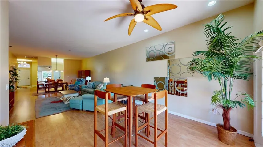 Dining space featuring ceiling fan, light wood-style flooring, and recessed lighting