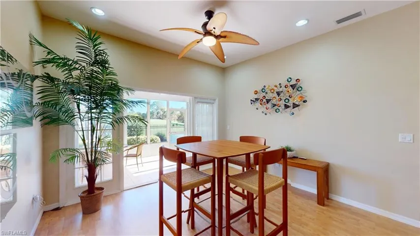 Dining space featuring ceiling fan, light wood finished floors, and recessed lighting