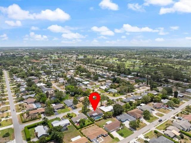 Birds eye view of property with a residential view