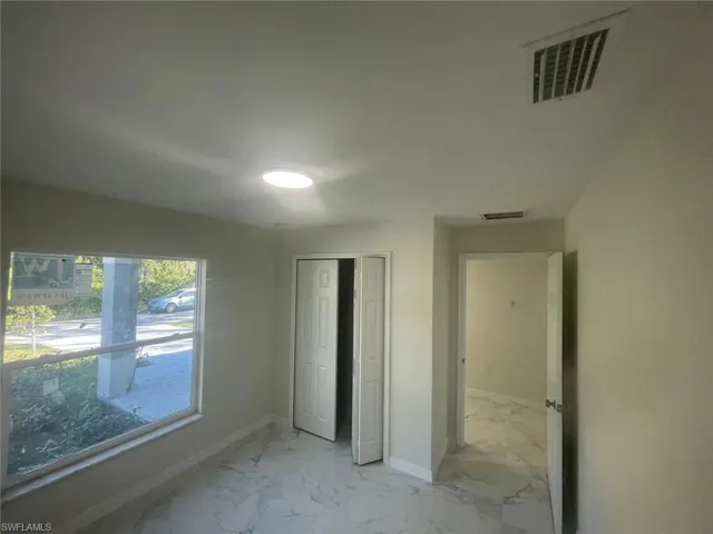 Unfurnished bedroom featuring a closet