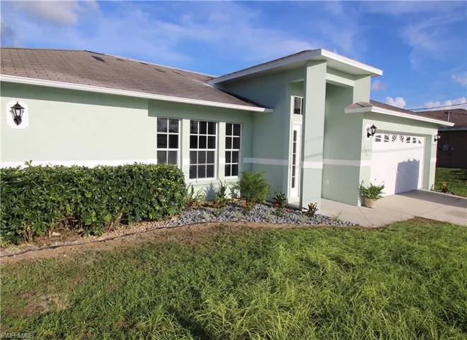 812 Champion Ave, Lehigh Acres, Florida 33971