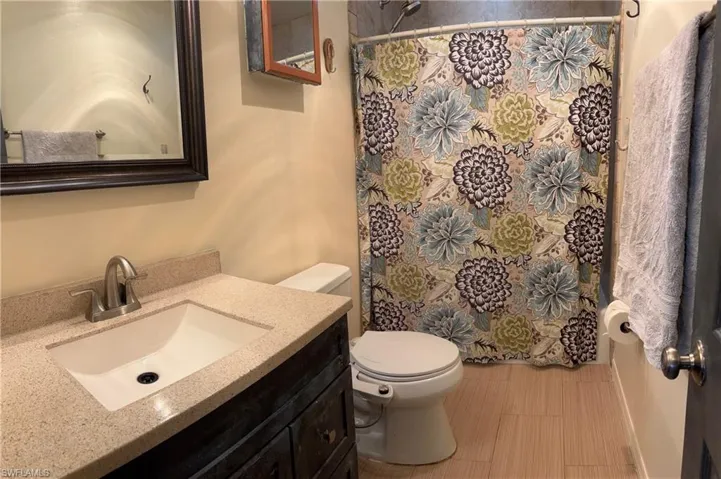Bathroom with toilet and vanity