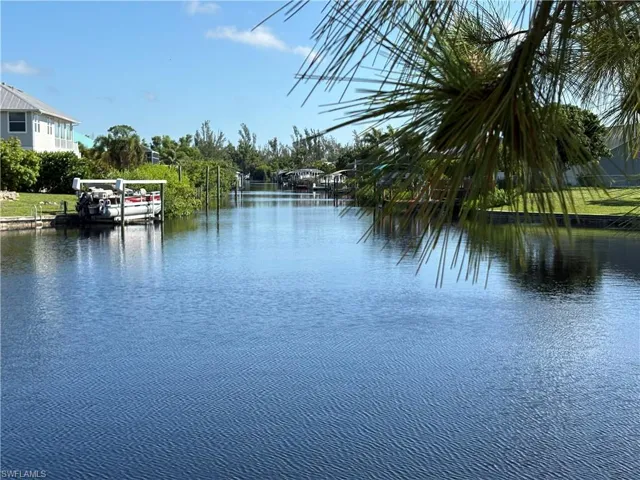 Water view with a boat dock