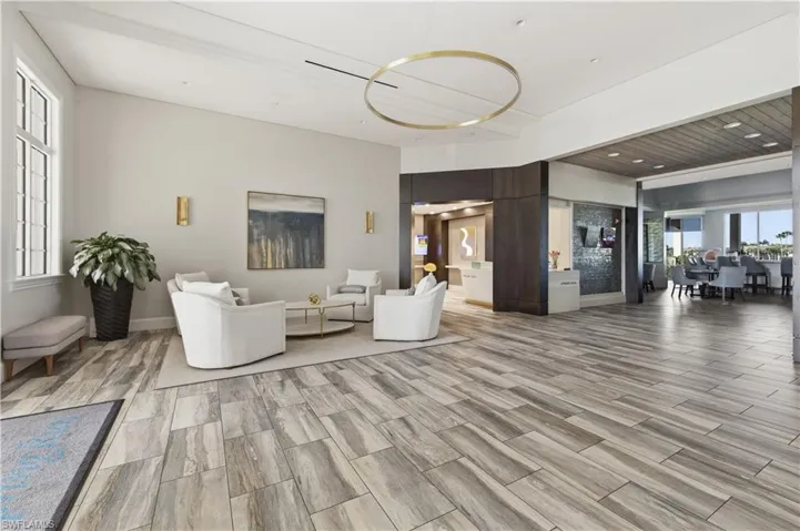 Living area featuring wood tiled floors