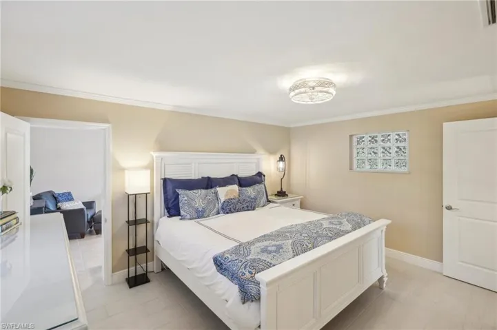 Bedroom with ornamental molding