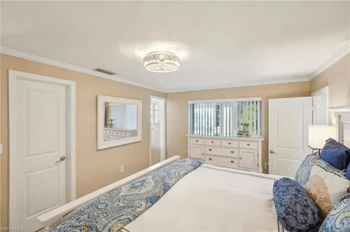 Bedroom with crown molding