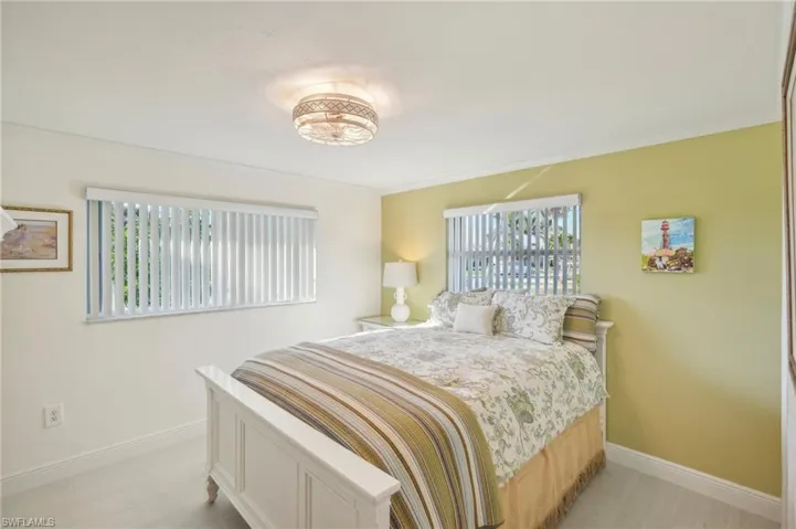 Bedroom featuring crown molding