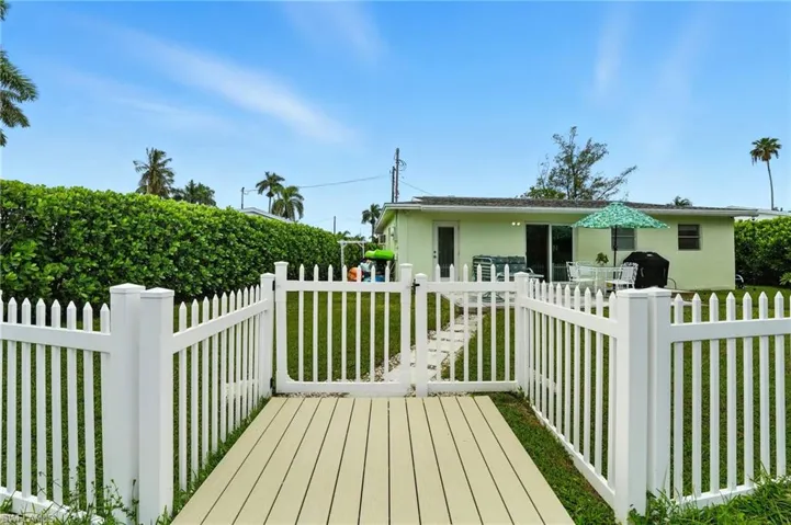 Deck featuring a fenced front yard and grilling area