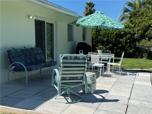 View of patio featuring an outdoor hangout area and outdoor dining area