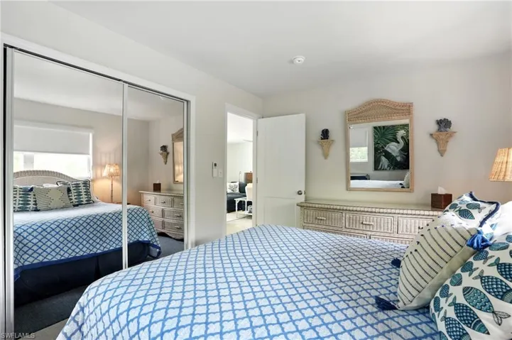 Bedroom with a closet and carpet flooring