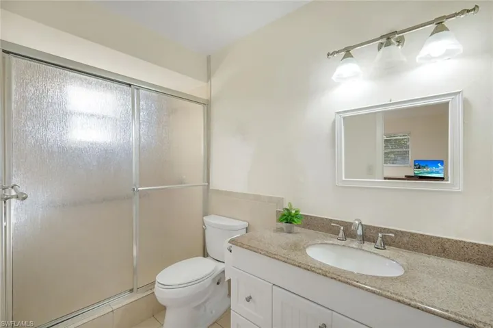 Bathroom featuring tub & shower combination