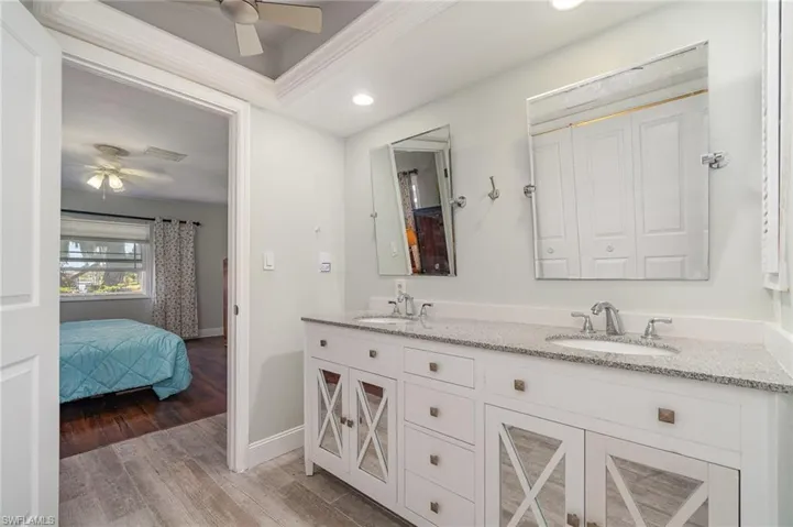 Another modern double fan set-up in the master bathroom