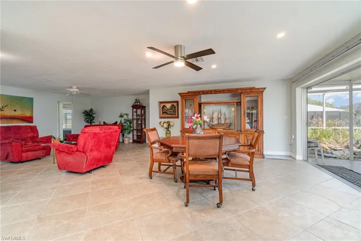 The living room & dining area combined as a waterfront Great Room
