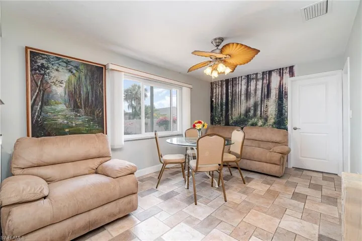 The 15' x 10' kitchen/dining area with a large window