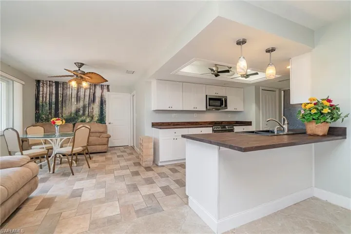 The Acacia wood countertops here are beautiful & unique
