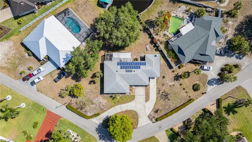 You get a large yard with this Gulf Access property