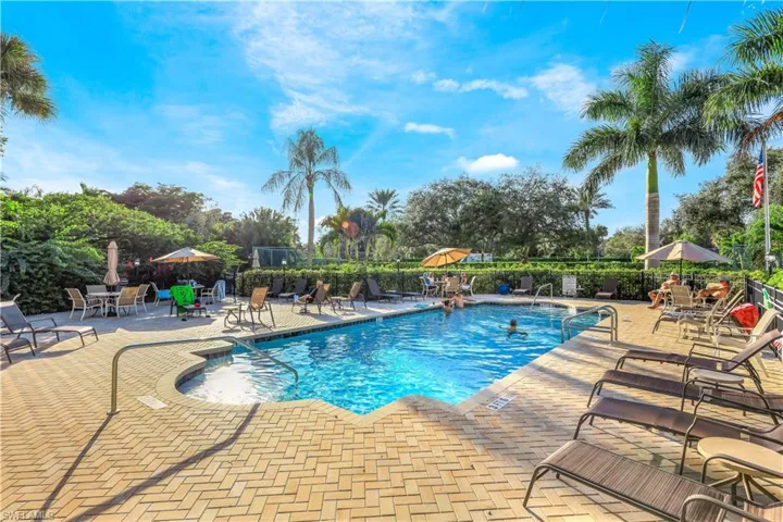 Community pool featuring a patio area