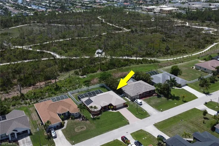 Aerial view of home, the backyard view is of nature preserve Joe Coviello Park