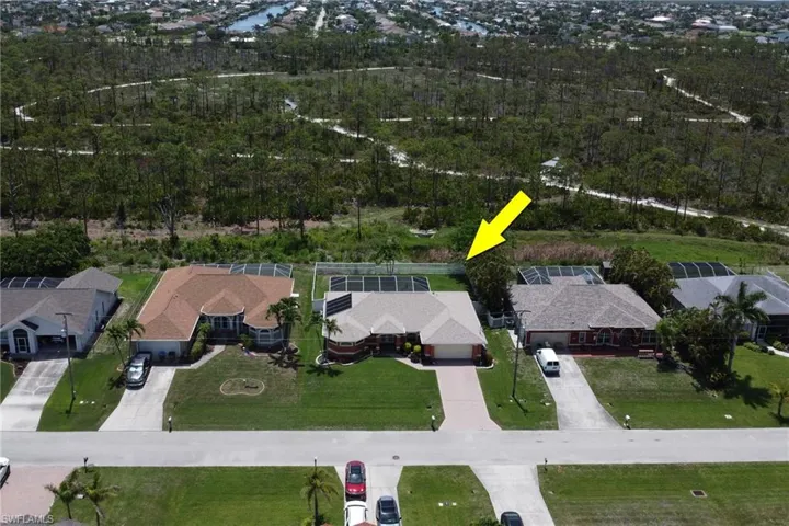 Aerial view of home, the backyard view is of nature preserve Joe Coviello Park