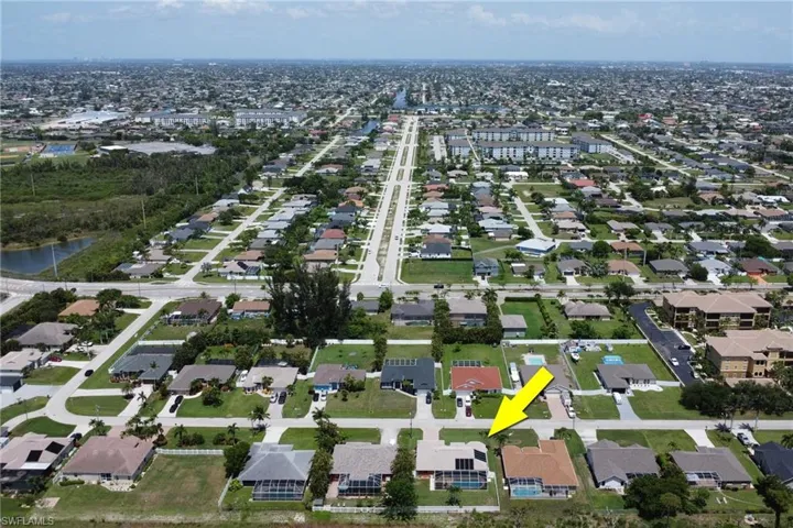 Aerial view from the backyard vantage point with an eastern directional view of Cape Coral
