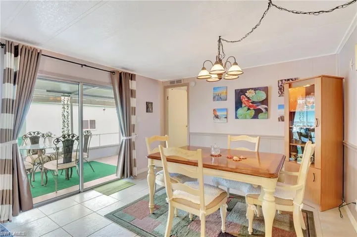 off Kitchen, access to the West facing lanai (1 of 2 lanais)