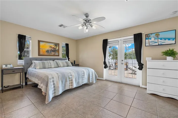 10679- Main and only bedroom duplex side walks out to pool and lanai area