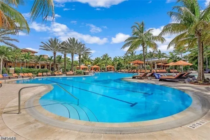 Community pool with a patio area