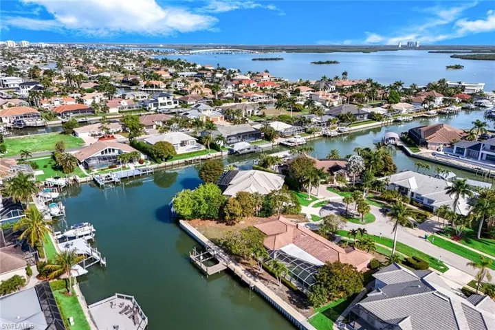 Aerial view of residential area with a large body of water
