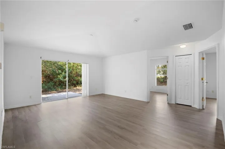 Empty room with light wood-style floors