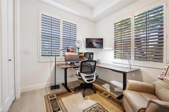Office area with a closet that has sound proofing and can also be used for 3rd bedroom.