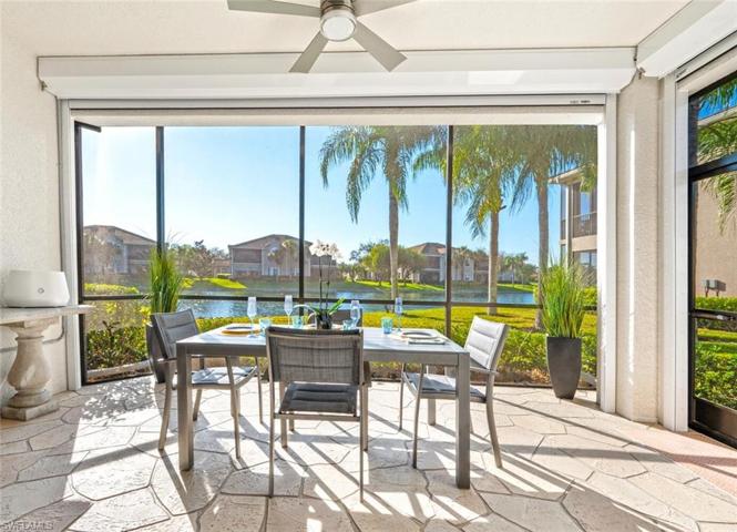 A screened in Lanai with stamped concrete . Lake and golf course views!