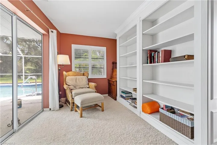 Living area with carpet floors