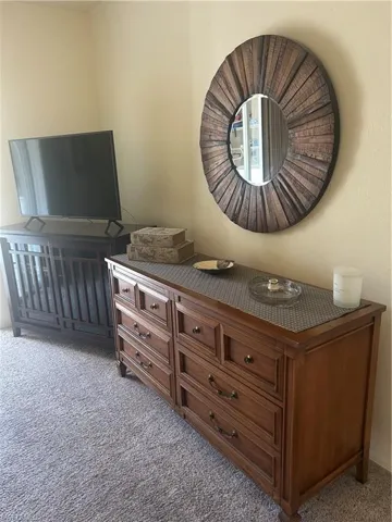 Detailed view of carpet, plenty of wall space.