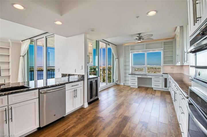 Kitchen with stainless appliances and wine frig