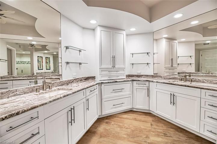 Primary bath with separate sink areas tons of storage
