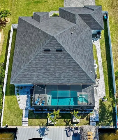 View from above of property featuring a pool area