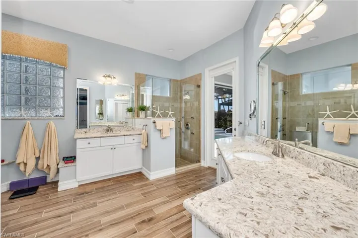 Fully remodeled Primary Bath with Changing/Exercise area. Doubles as the Cabana Bath