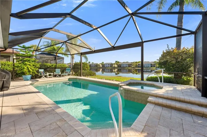 Beautiful Terrazzo pool deck, panoramic screen, solar heating and newly refurbished pool cage.