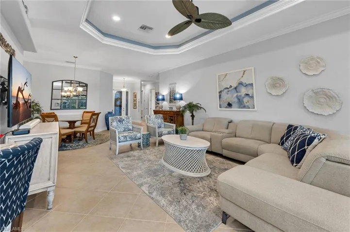 Light and airy decor featuring ceiling detail