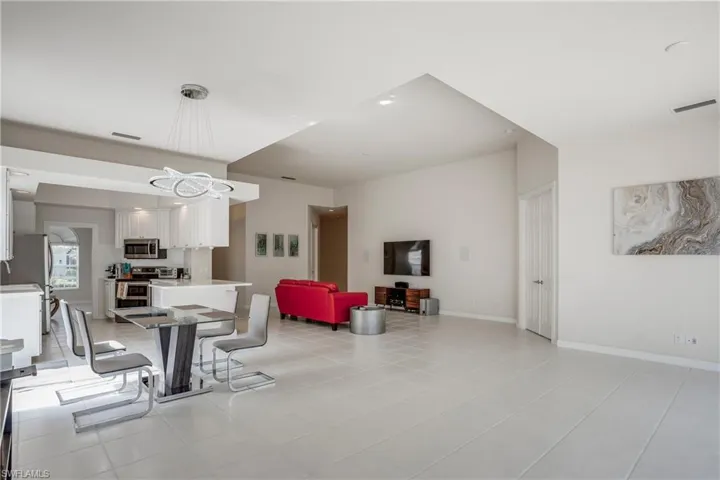 Dining area featuring baseboards and visible vents