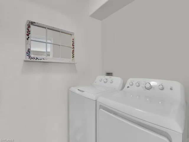 Laundry area with separate washer and dryer