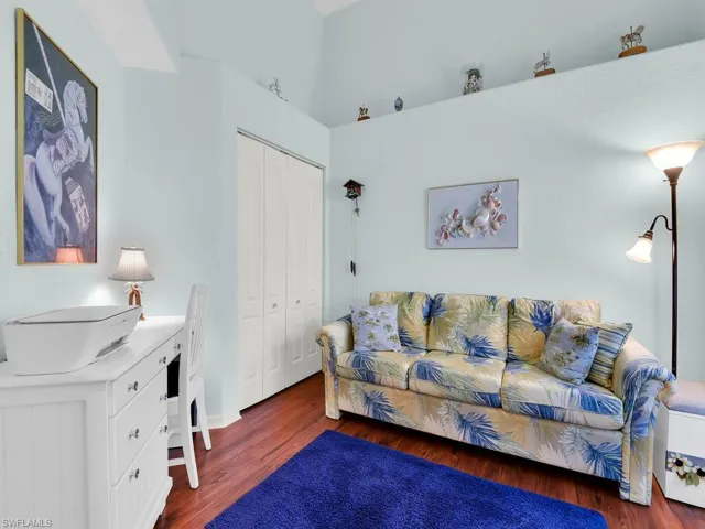 Living area featuring wood finished floors and baseboards