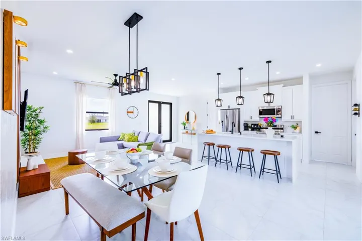 Dining space featuring recessed lighting