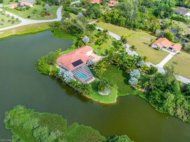 Aerial overview of property's location featuring a large body of water